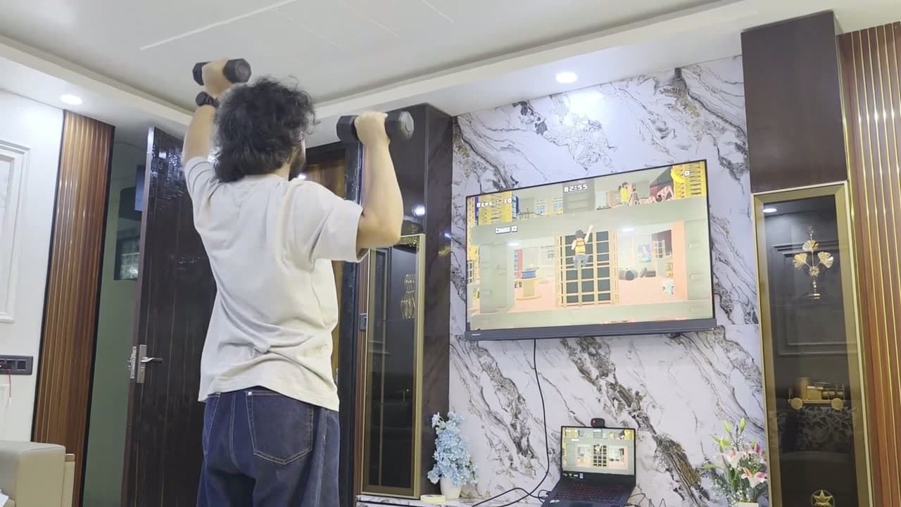 A player pressing light dumbbells while playing Rep Rush